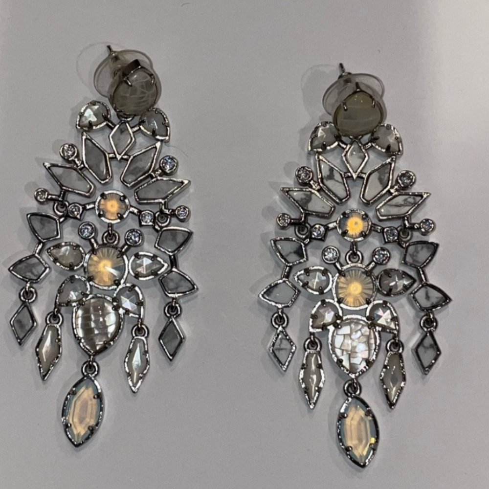 Looking.. kendra scott chandelier earrings